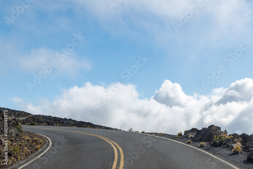 Fotografie Mountain road above the clouds with scenic views