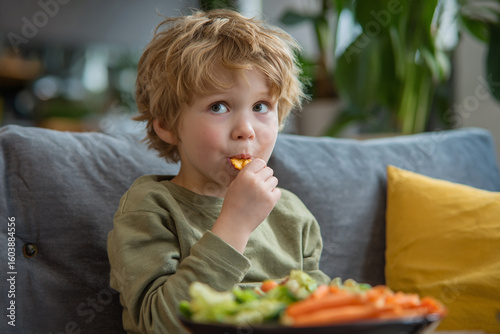 Online lesson paused while child snacks