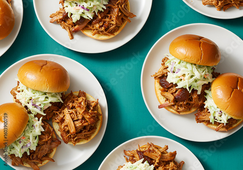 Pulled pork sandwiches arranged on plates