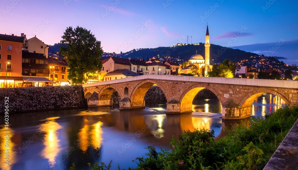Obraz premium Evening cityscape of a historic bridge