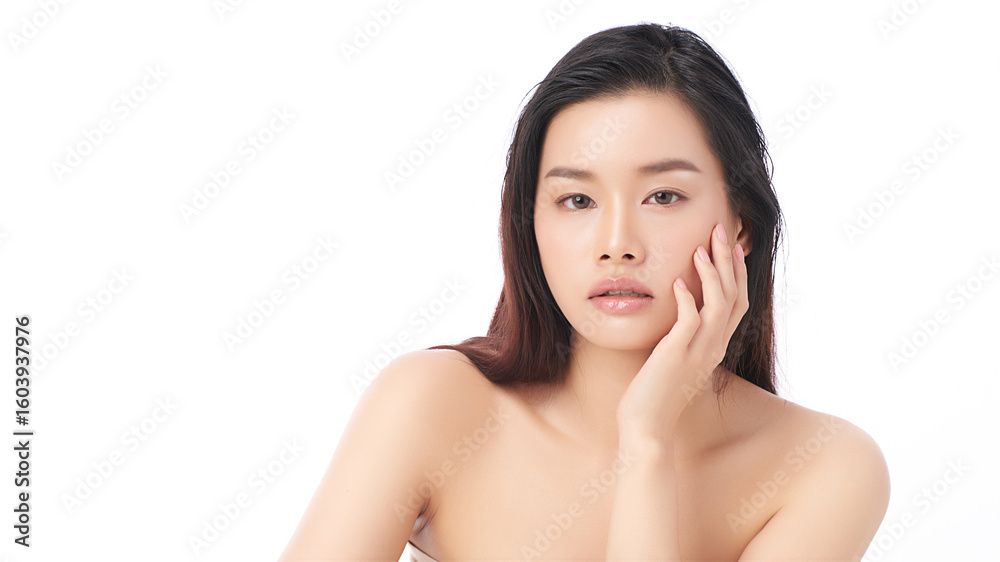 A beautiful young Asian woman with clean, fresh skin against a white background. Skincare, facial treatment, cosmetology, beauty, and spa. An elegant portrait of an Asian woman. A beautiful young Asian woman with clean, fresh skin against a white background. Skincare, facial treatment, cosmetology, beauty, and spa. An elegant portrait of an Asian woman.