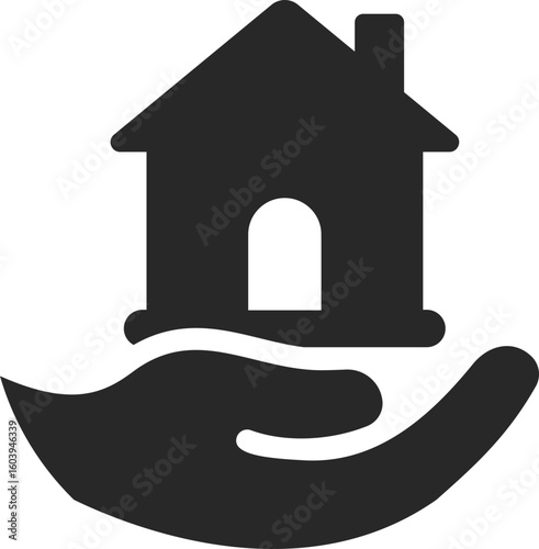 Hand holding house symbolizing charity support, community care, and volunteer help for shelter needs