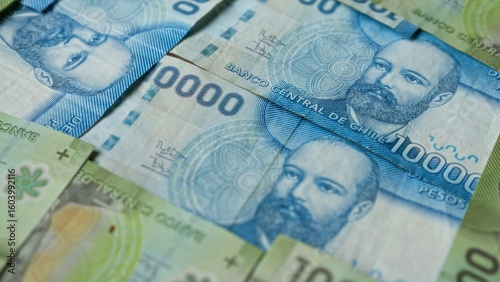 Fotografie Closeup of chilean 10000 peso banknotes featuring a portrait with banco central