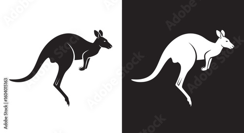 A graphic illustration of two jumping kangaroo silhouettes, one black on white and its negative white on black.
