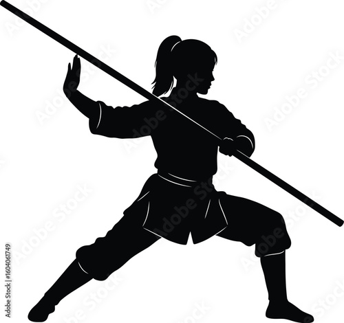 Silhouette of a Female Martial Artist in a Fighting Stance with a Bo Staff Weapon