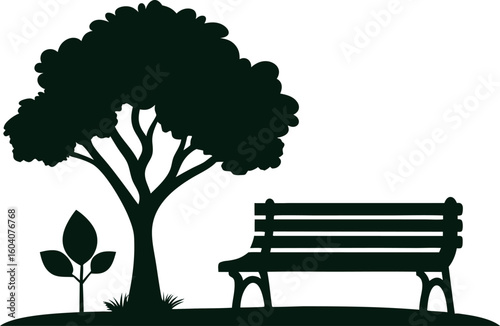 silhouette of a park bench with a tree 