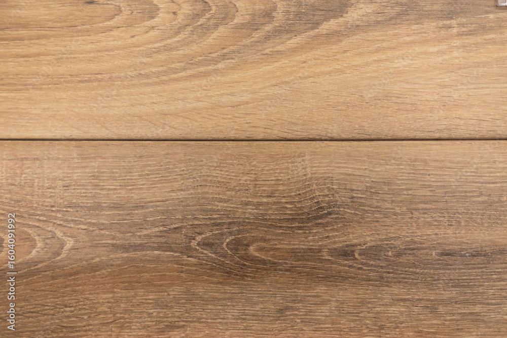 Fototapeta premium Wooden surface with natural grain detail in warm tones creating a cozy atmosphere for interior design