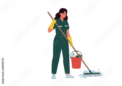 A cleaner with yellow gloves is mopping a surface with a brown mop