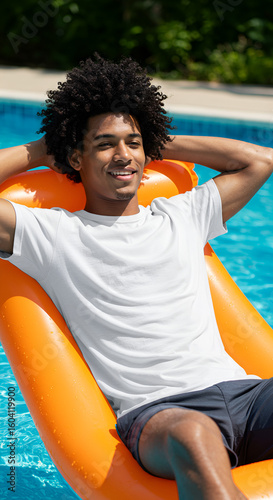 Man relaxing on inflatable pool lounge