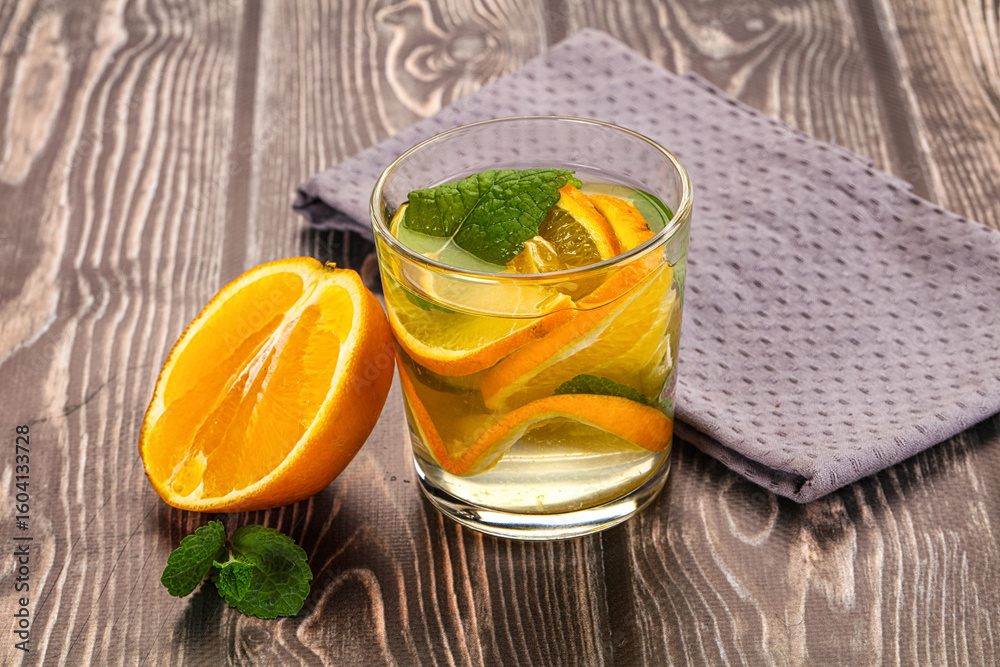 Fototapeta premium Fresh homemade orange lemonade with mint