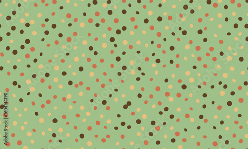 Delightful pastel green background adorned with a scattered confetti of earthytoned dots.