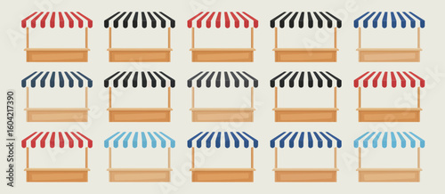Collection of empty market stalls with striped awnings