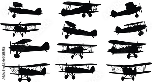 Vintage biplane silhouette vector set, black retro aircraft illustrations in various flight angles, antique aviation design for graphic use.