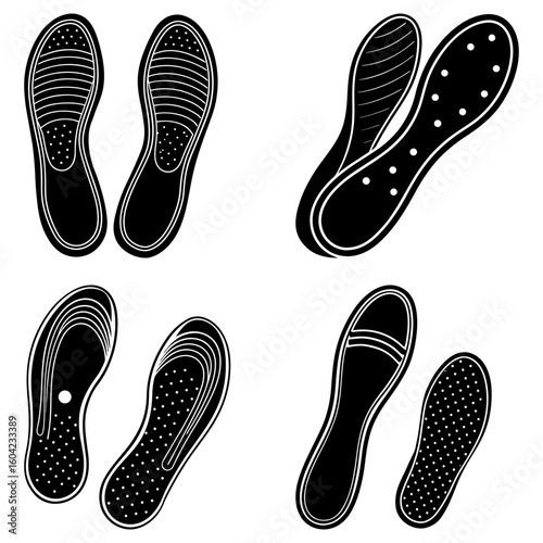 Various black and white shoe insoles displayed in pairs with different designs and textures visible clearly
