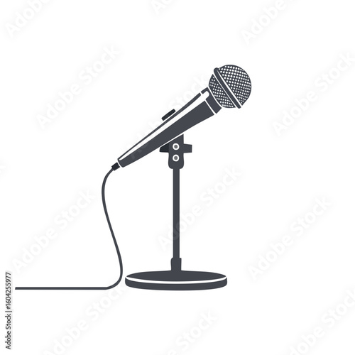 Isolated microphone on stand against black background for music, speech, or performance