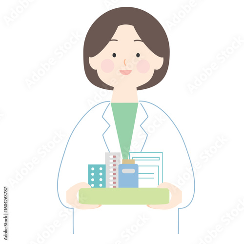 処方薬を持つ薬剤師の女性