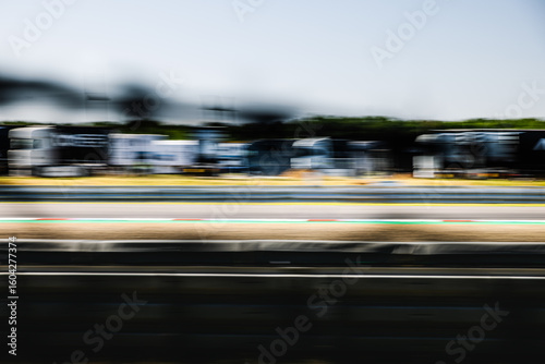 Race track, circuit panning, side view