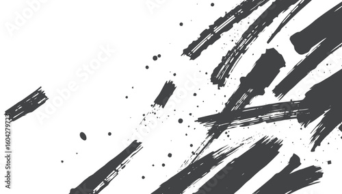 Scattered black brush strokes and splatters on a white background