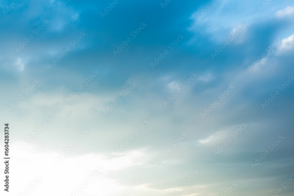 Fototapeta premium Blue sky with scattered clouds white atmospheric