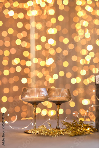 Sparkling Champagne Glasses with Bokeh Lights