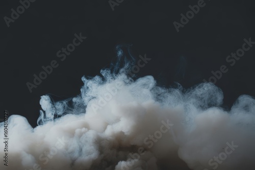 White smoke swirling against dark background grey