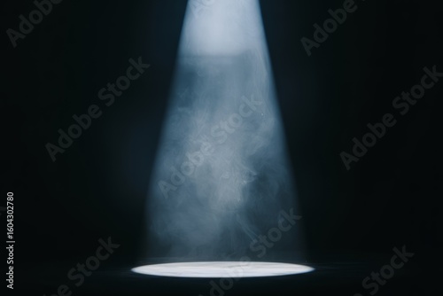 White spotlight beam illuminating smoke image