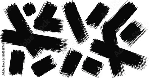Abstract black brush strokes forming cross shapes on a white background with rough edges and texture