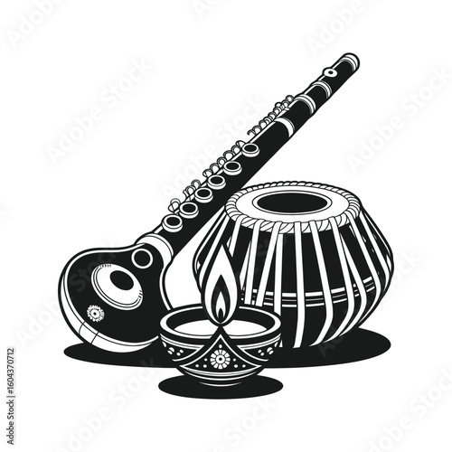 Indian musical instruments and lit lamp flute tabla