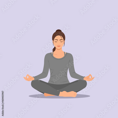 Woman Meditating Indoors in Lotus Position Achieving Mindfulness and Relaxation