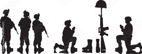 Soldiers praying honoring fallen comrades with weapons and helmets military kneeling