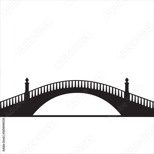 Elegant black silhouette of an arch bridge with ornate railings