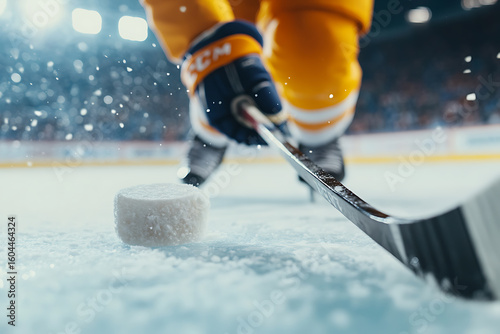 Face-off! A captivating close-up of a hockey puck on the ice. Action captured at the moment of impact during an ice hockey game, intense, fast-paced.