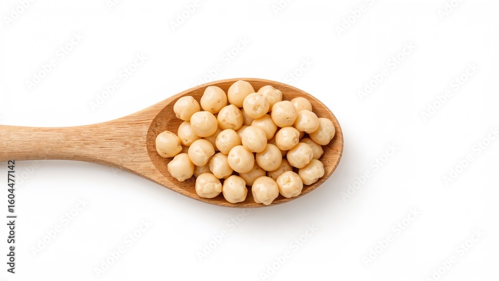 Spoonful of chickpeas against a white background Spoonful of chickpeas against a white background