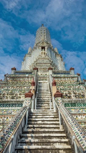 Pagoda at Wat Arun, a royal temple in Bangkok, Thailand. Time lapse video on a sunny day.