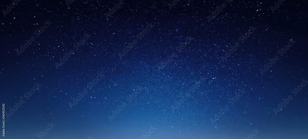 Fototapeta premium The serene night sky filled with countless twinkling stars.