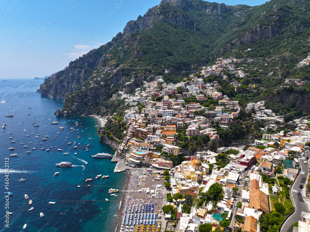 Naklejka premium Positano, Amalfi coast, sea, ocean, city, town, travel, landscape, view, coast, sky, architecture, bay, water, beach, panorama, europe, tourism, ocean, cityscape, summer, italy, mediterranean, buildin