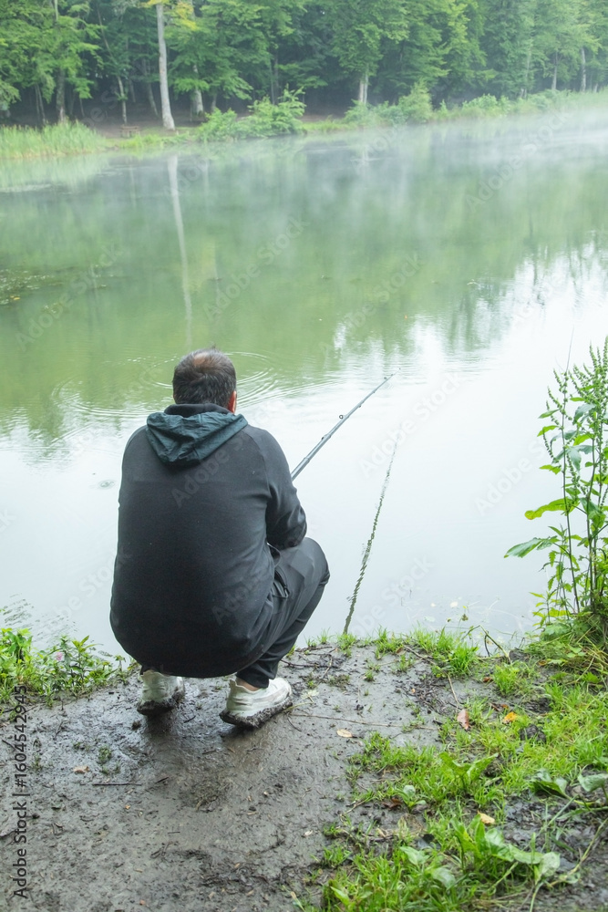 Obraz premium Fisherman catches fish. Fishing. Hobby