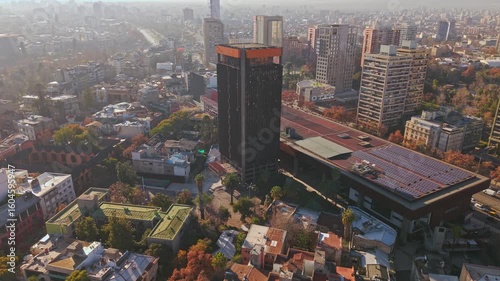 Aerial establishing drone fly Santiago de Chile, at daylight, cityscape with Gabriela Mistral Art Center