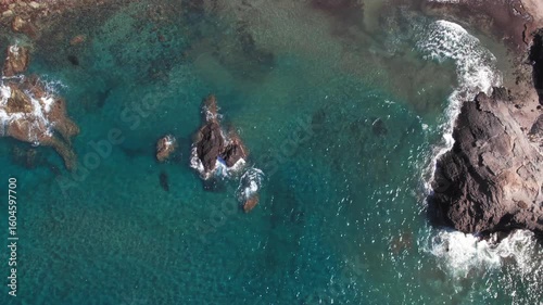 Aerial birdseye view of the rocky and dry coastline of Cabo de Gata-Nijar Natural park, Almeria, Spain