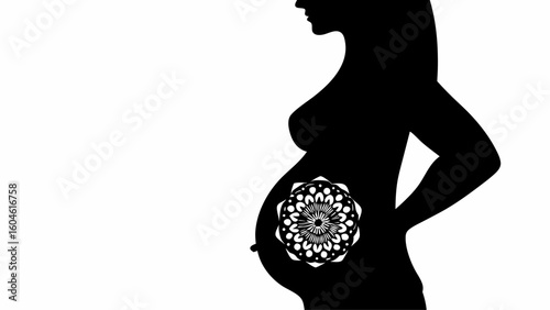 Silhouette of pregnant woman with mandala on belly representing motherhood and new life celebration art