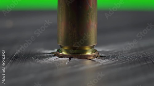 Bullet casing pressure cracks material surface sparks fly
