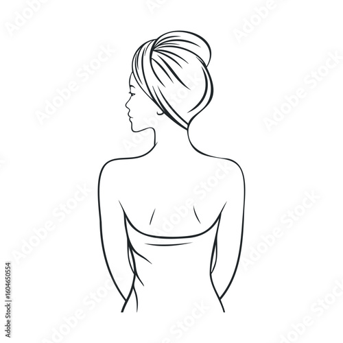 Elegant woman in towel with hair wrapped preparing for relaxation