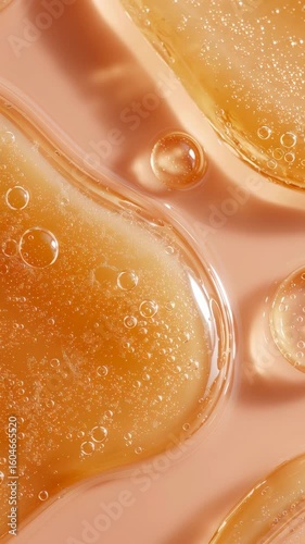 Golden Skincare Serum Texture with Air Bubbles Gently Moving in Macro Beauty Product Shot 4K