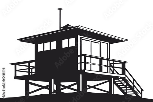 Lifeguard tower silhouette on sandy beach ocean summer