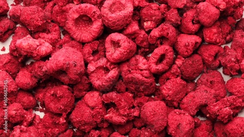 submimated raspberry, rotation in circle. red dried raspberries, Turning. fruit and berry season