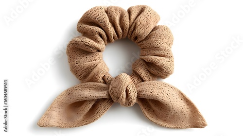 Knitted hair tie with a bow.
