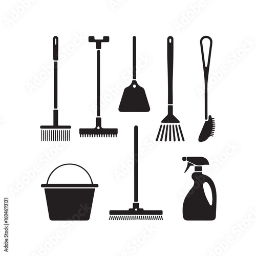 Collection of silhouetted cleaning tools including brooms mops dustpan bucket and spray bottle on white background