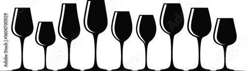Collection of elegant champagne flutes in a row against a white background