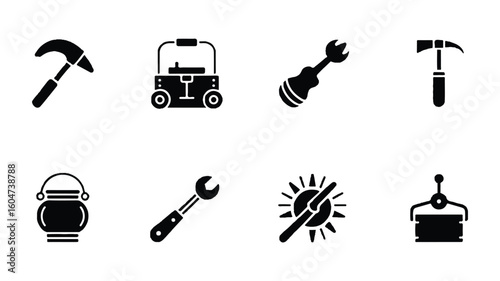 Collection of black and white tools for various crafts and trades depicting simplicity and utility
