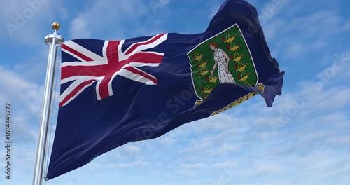 British Virgin Islands flag with flagpole waving in wind, rolling clouds background looping, 4K video (Perfect Loop)
